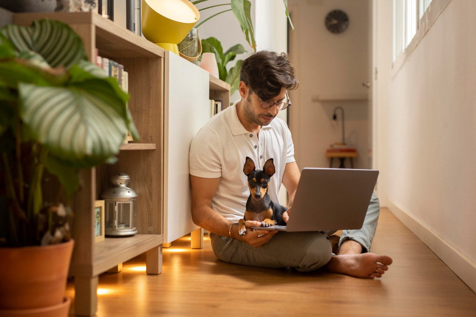 Home person working from home with pet dog